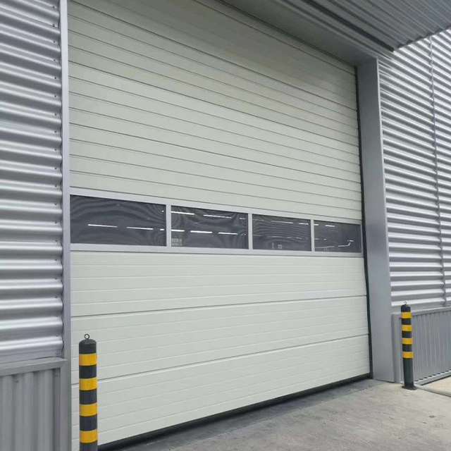 Industrial sectional door for factory