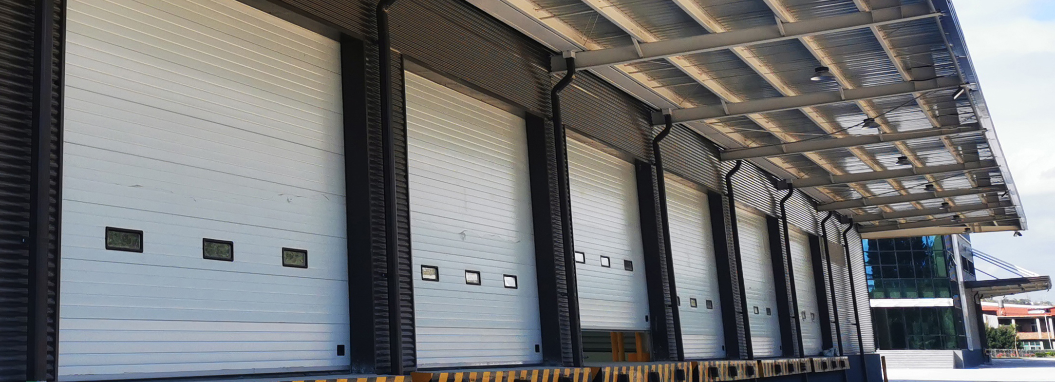 Maximize Efficiency and Security with YUOU Industrial Sectional Doors