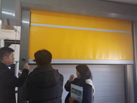  Thailand customer checking the sample of PVC fast door 